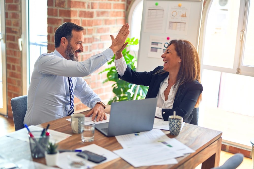 Consultants reviewing analytics results together